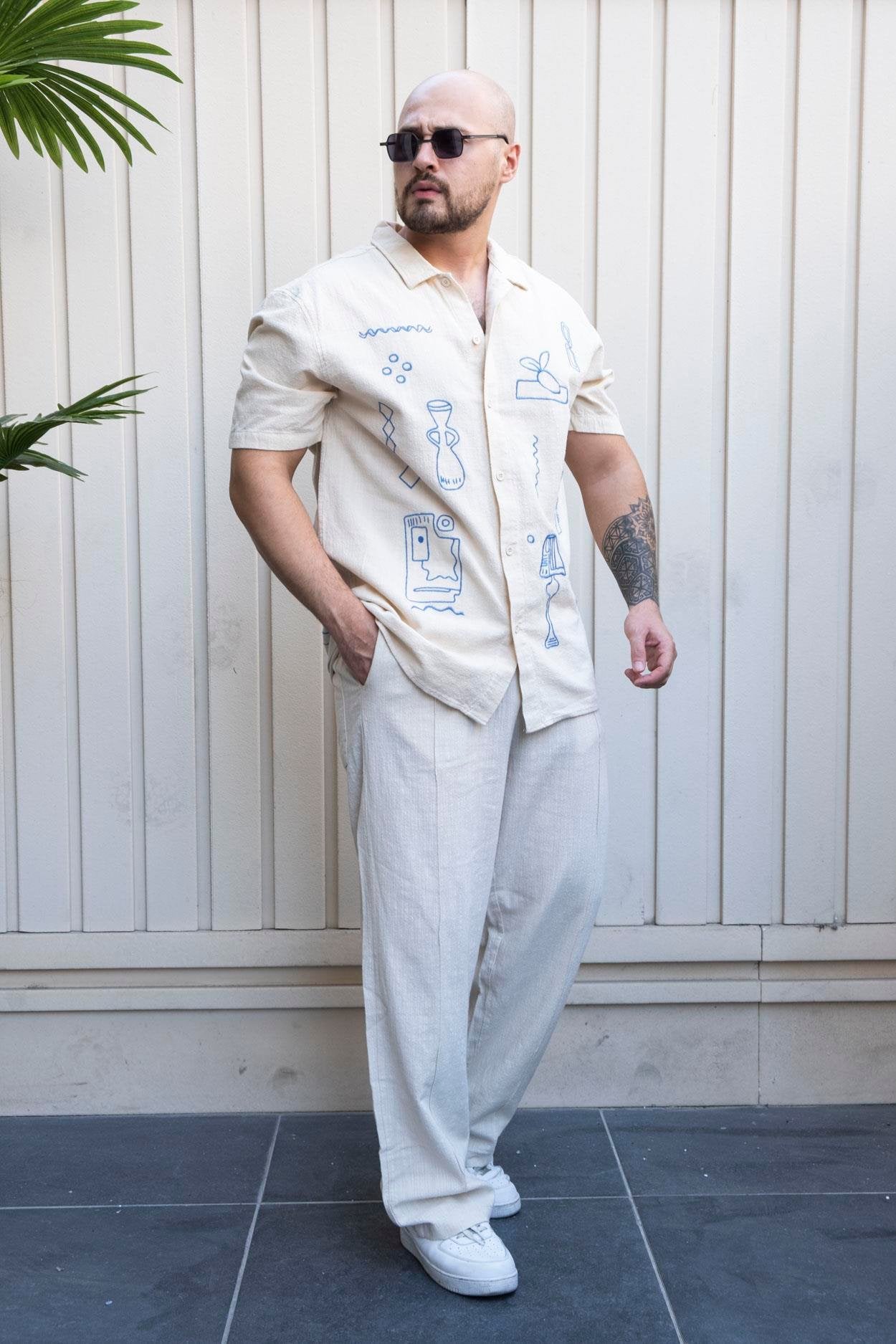 Elegant Artisan Linen Shirt with Relaxed Fit and Embroidered Design
